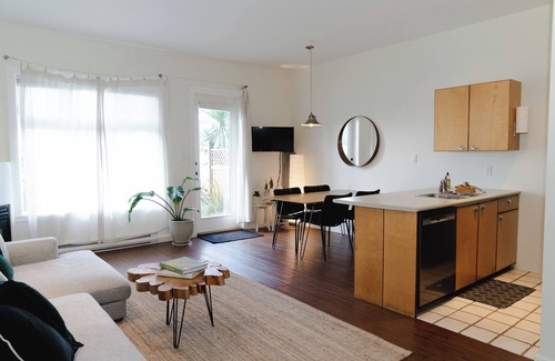 Tofino Condo | Goodview Suite - licensed waterfront studio with a fireplace and patio