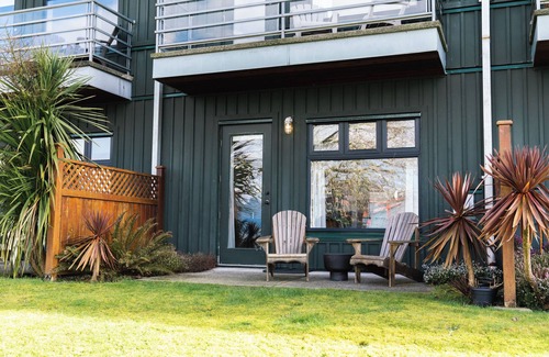 Tofino Condo | Goodview Suite - licensed waterfront studio with a fireplace and patio