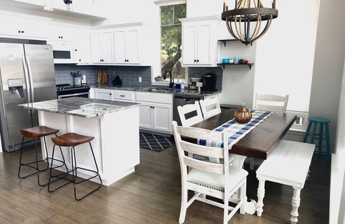 Hoyt House | Gorgeous lake house with sandy beachfront. Welcome to Lost World Landing