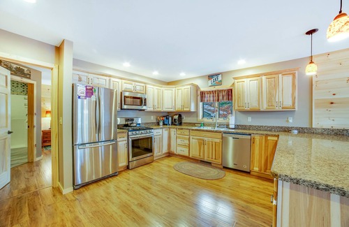 Chestertown House | Gorgeous Lakefront Home with a Fire Pit, Two Living Areas, and a Sunroom