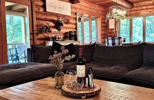 Lawndale Cabin | Gorgeous XL Log Cabin in Bloomington, IL! 2 Game Rooms + Hot Tub & Sauna!