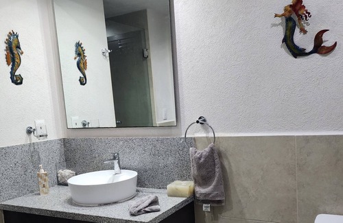 Diaz Ordaz Condo | Grand Venetian 25th floor beachfront