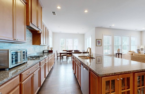 The Glade House | Grande at Canal Pointe home with pools, sports courts, & gym