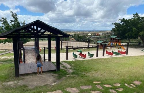 Saire Apartment | GRAVATÁ - FLAT PREMIUM NO MONTE CASTELO - quarto superior com Wi-Fi e netflix