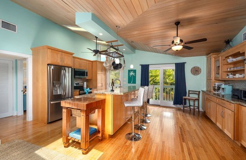 Sugarloaf Shores House | Green Turtle Oasis: Lovely 4BR Canal Front Home, Pool, Dockage, Tiki, Outdoor Dining & Pet Friendly!