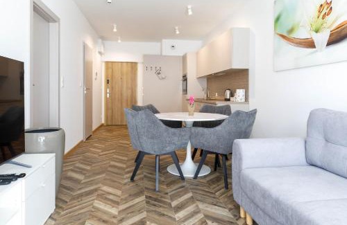 Stare Miasto Apartment | Grey Harmony Apartment by UniqueRent