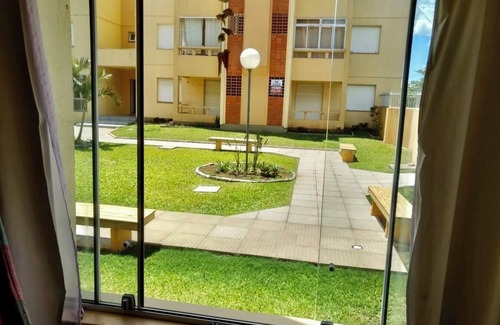 Capao da Canoa Apartment | Ground floor apartment with garden view