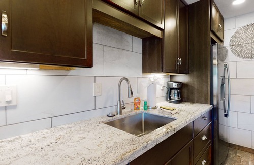 Carefree Condo | Ground-floor condo with on-site pool, grills, patio, & central AC