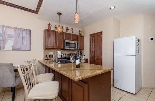 Puerto Penasco Condo | Ground Floor! Walk from private patio to Beach, Pool, Swim-up Bar, Jacuzzis!
