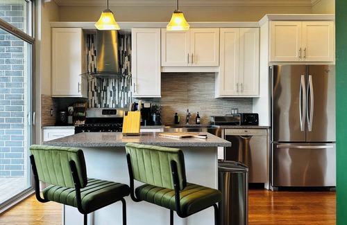 Near West Side Apartment | Gym, Garage Parking, Balcony, Sleeps 4