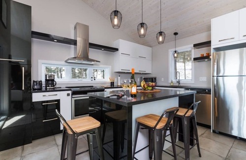 Saint-Joseph-de-la-Rive Ski Chalet | Hôtel à la maison - Panorama, spa et fleuve