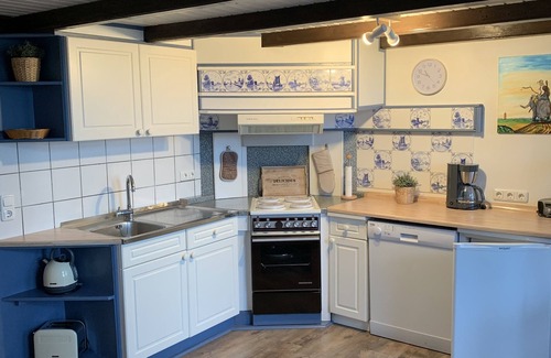 Altfunnixsiel Apartment | Harlequartier apartment, directly on the Harle with jetty, near Carolinensiel