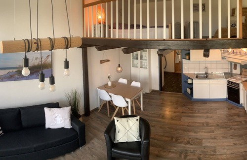 Altfunnixsiel Apartment | Harlequartier apartment, directly on the Harle with jetty, near Carolinensiel