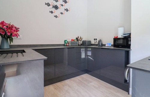 Axminster Cottage | HARTGROVE FARM BUNGALOWS, pet friendly, with open fire in Musbury