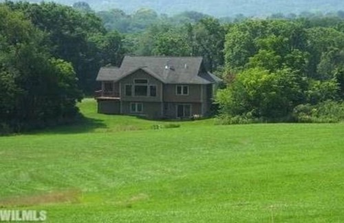 The Galena Territory House | Has beautiful open living space. Nestled in the picturesque countryside.