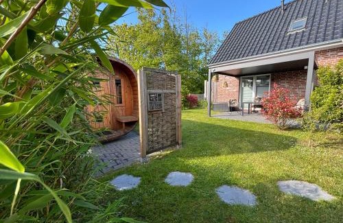 Dornum House | Haus Nordseeliebe mit Außensauna, Outdoor Dusche und Wallbox
