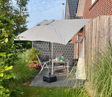 Dornum House | Haus Nordseeliebe mit Außensauna, Outdoor Dusche und Wallbox