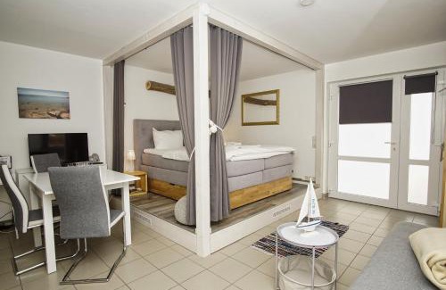 Wiek Apartment | Haus Windland FeWo 24 mit eingezäuntem Garten - ideal für den Hundeurlaub