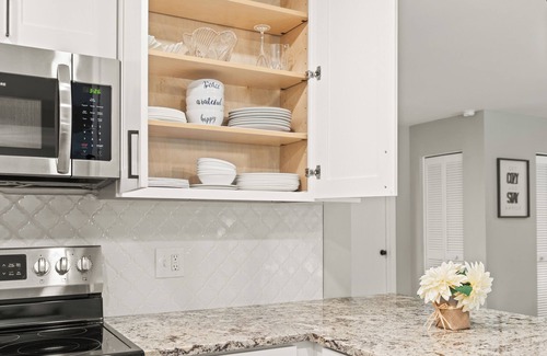 Palm Harbor House | Heated pool. 4-bedroom house. 6.9 miles to honeymoon Beach.