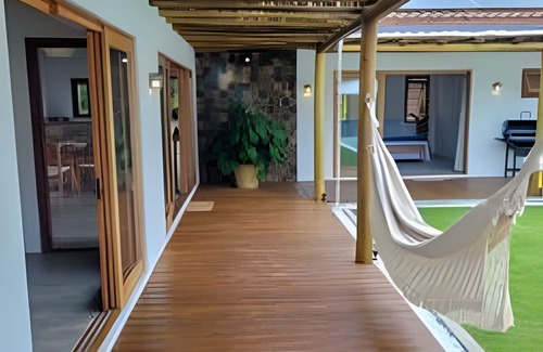 Pontal da Cruz House | Heated pool with hydro and beach