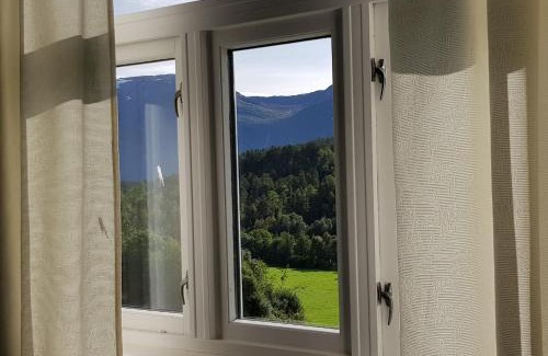 Eid House | Heggjabygda Gjestegard - historisk tømmerhus i landlige omgivelser