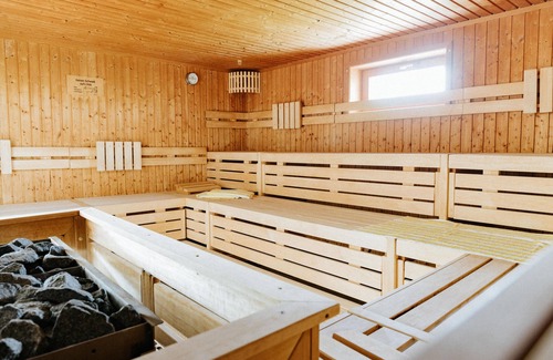 Scheidegg Apartment | Heimatel family studio including pool and sauna with a large terrace