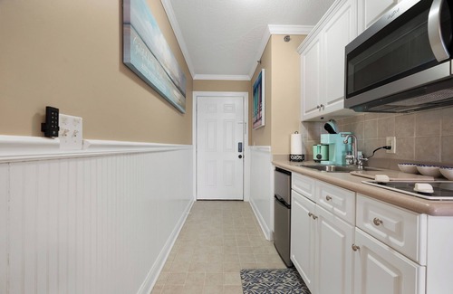 Wilmington Beach Condo | "Hermits Hide-a-way" Salty air, a SEA view and a pool!