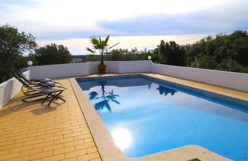 Ariolos Villa | Hidden villa with pool and sea views, located in a green area.
