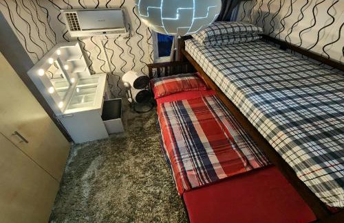 Santo Cristo Apartment | High-Tech Studio at Grass Residences -2 persons only, Quezon City