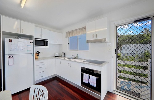 Woodgate House | Highset one street back from the beach