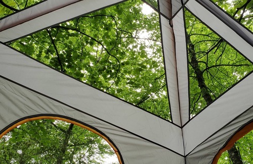 Black Mountain RV Rental | Hillside Deck Tent Camping on private wooded property.