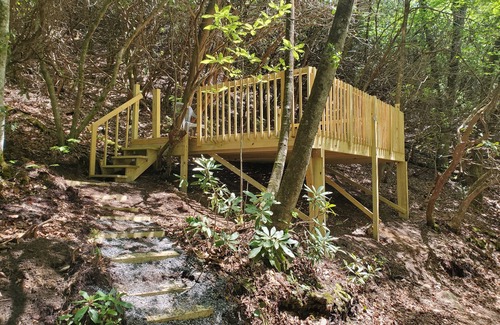 Black Mountain RV Rental | Hillside Deck Tent Camping on private wooded property.