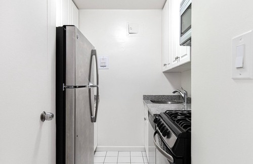Union Square Apartment | Hip Flatiron Studio w/Gym, Doorman, near USQ, train, by Blueground