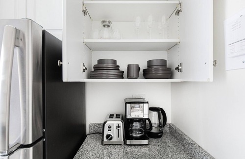 Union Square Apartment | Hip Flatiron Studio w/Gym, Doorman, near USQ, train, by Blueground