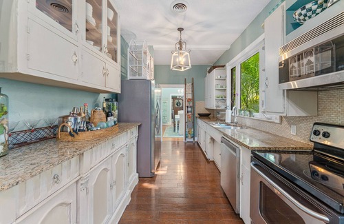 Valencia Terrace House | Historic 1920's spanish-style home just off Palm tree lined McGregor Blvd