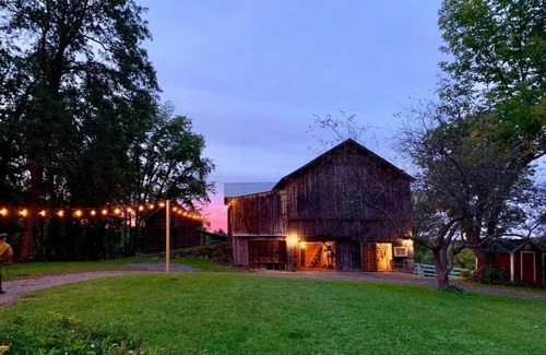 Greenville House | Historic Hudson Valley farmhouse with scenic barn and fire pit on a working farm