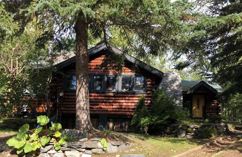Mid-Hillside House | Historic Log Home in Upscale, Wooded Neighborhood