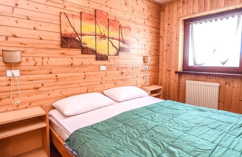 Dosso Veronza Apartment | Holiday Apartment "Centro Veronza" with Mountain View, Shared Pool & Wi-Fi