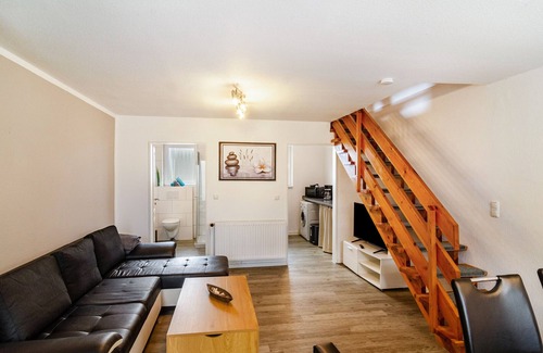 Wangerland Apartment | Holiday Apartment "Nordsee 1" with Shared Terrace, Shared Garden & Wi-Fi