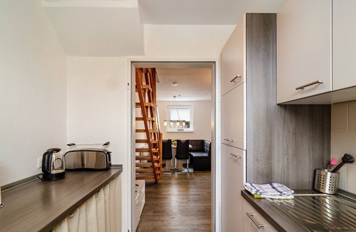 Wangerland Apartment | Holiday Apartment "Nordsee 1" with Shared Terrace, Shared Garden & Wi-Fi