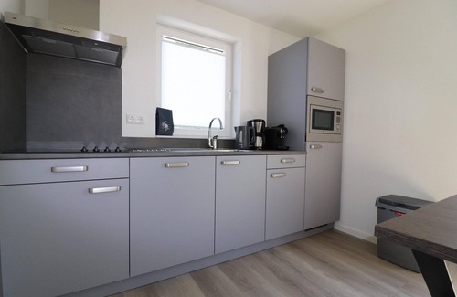Municipality of Nissewaard House | Holiday Home by Lake Beach Simonshaven