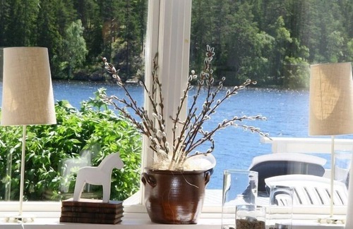Asbro House | Holiday home,fantastic view of the lake,own boat and a small private footbridge