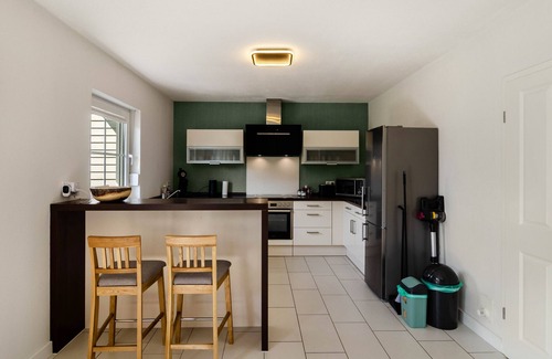 Wiesmoor House | Holiday Home 'Ferienhaus Wiesmoor' with Private Terrace, Private Garden and Wi-Fi