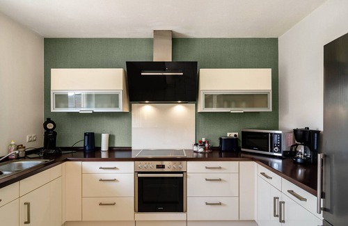 Wiesmoor House | Holiday Home 'Ferienhaus Wiesmoor' with Private Terrace, Private Garden and Wi-Fi