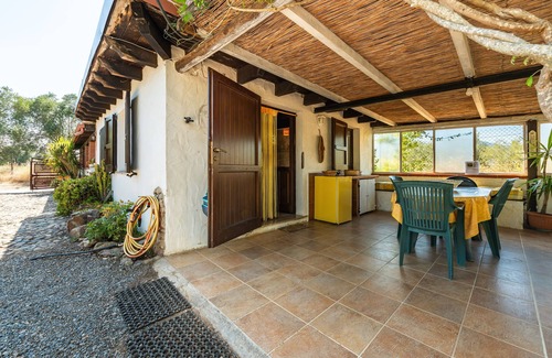 Villamassargia House | Holiday Home 'Pretty House' with Private Terrace, Wi-Fi and Air Conditioning