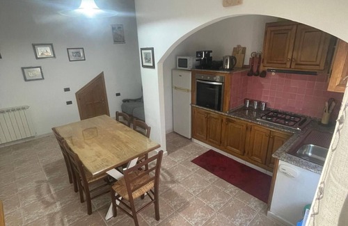 Jerzu House | Holiday Home 'Sa Omu De Sa Palgia' with Sea View, Balcony and Air Conditioning