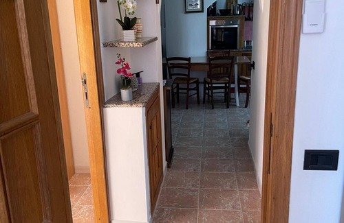 Jerzu House | Holiday Home 'Sa Omu De Sa Palgia' with Sea View, Balcony and Air Conditioning
