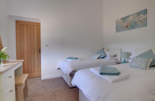 Abbess Roding House | Holiday Home The Milking Parlour by Interhome