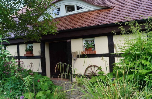 Garz/Rugen House | Holiday home with fireplace, patio and a view of nature