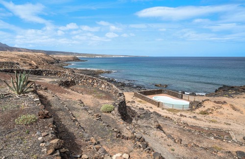 Haria Villa | Holiday Villa 'Playa Marina Eco Beach' with Sea Views, Shared Pool and Wi-Fi
